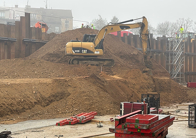 Parkování u Sisters. Kombinace podzemních garáží a parkovacího domu